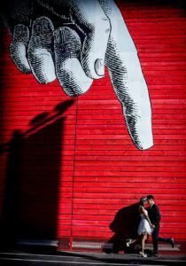 wedding couple under finger London southbank