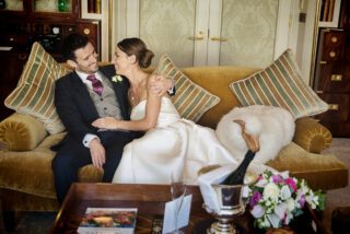 wedding couple hug in Royal Suite at The Goring Hotel