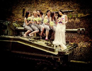 Bridesmaids sit on tank again at London Islington wedding day image