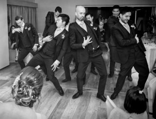 Groomsmen dance at Stokes Hotel wedding reception