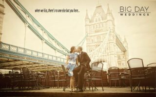 Wedding couple kiss under Tower Bridge London photo