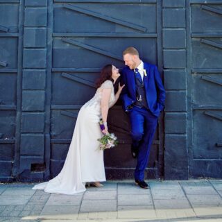 Islington-wedding-couple-pose-on-Upper-Street-London
