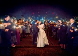 Trinity Buoy Wharf Wedding sparklers shot with bride and groom and O2 in background