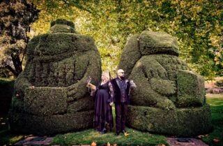 Alternative London wedding couple with owls Hall Place Gardens