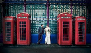 London wedding couple by phone boxes Smithfield