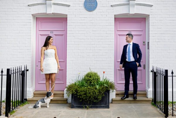 Chelsea Old Town Hall Wedding couple by pink doors