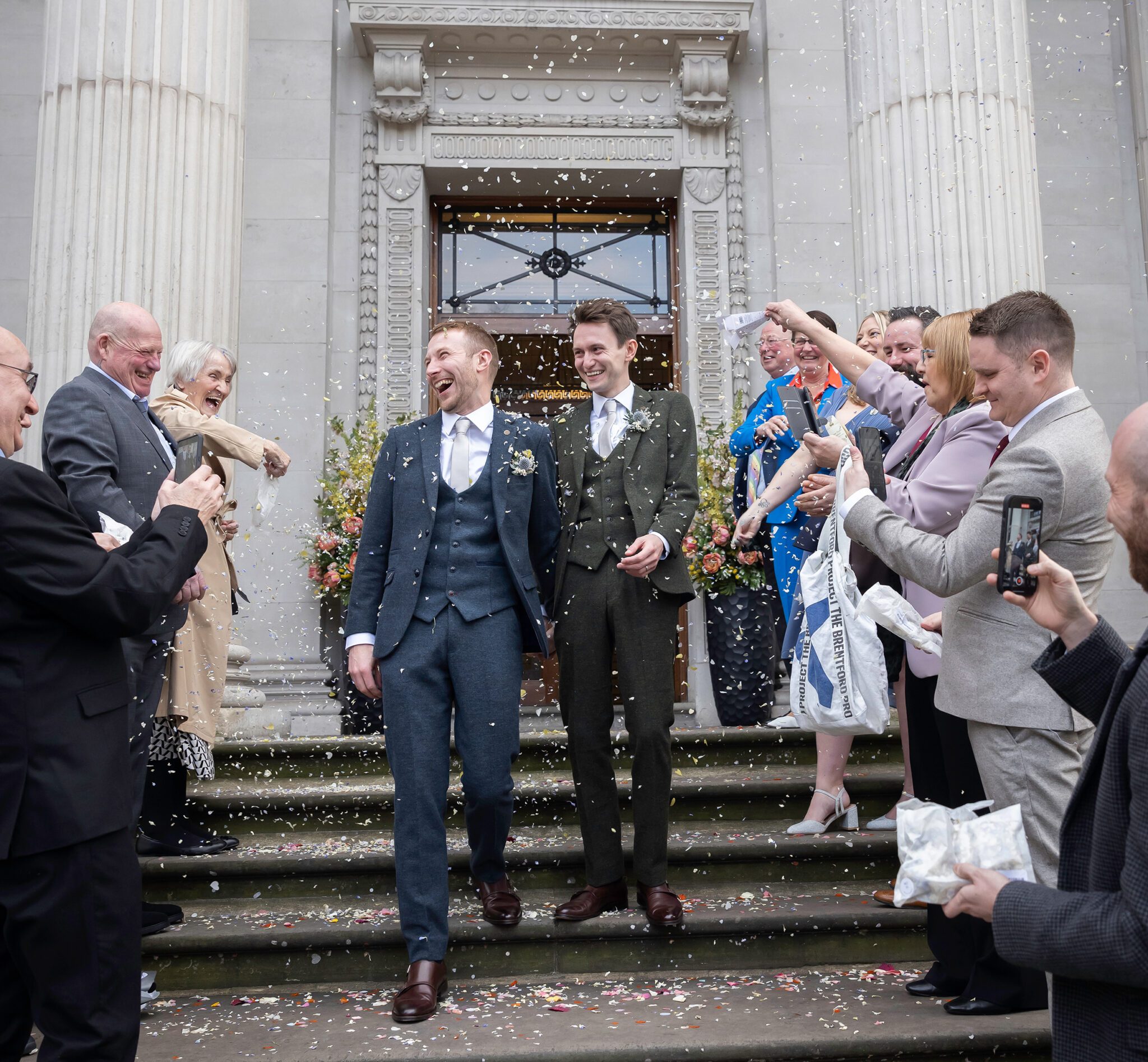 Confetti throw two grooms Old Marylebone Town Hall wedding 2
