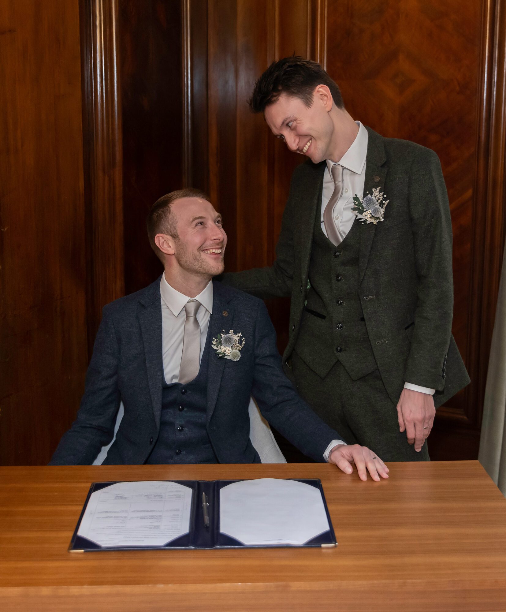Signing the register Old Marylebone Town Hall gay wedding