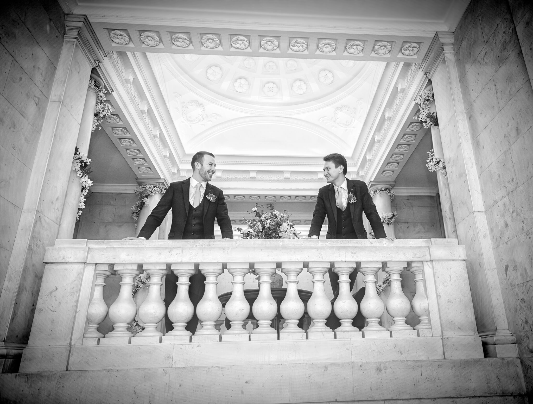 Two grooms on balcony Old Marylebone Town Hall