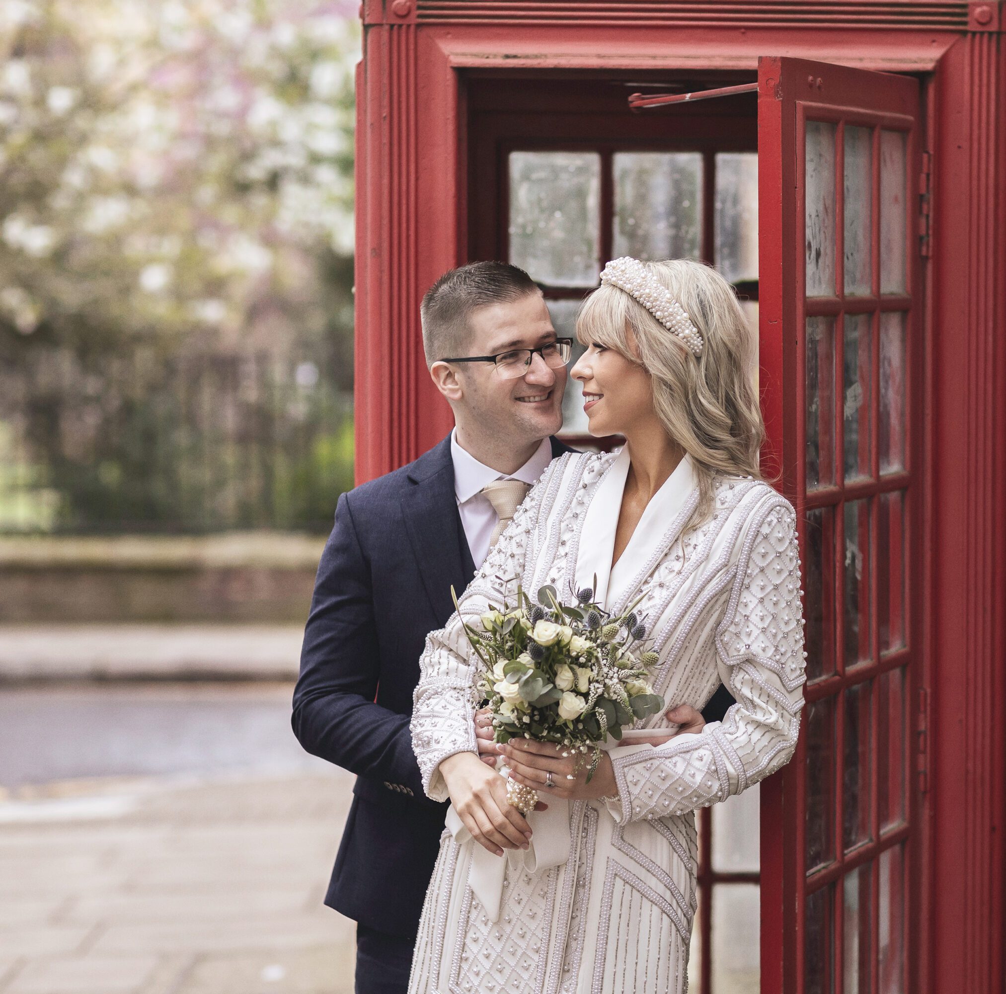 Chelsea Old Town Hall bride and groom in red phone box