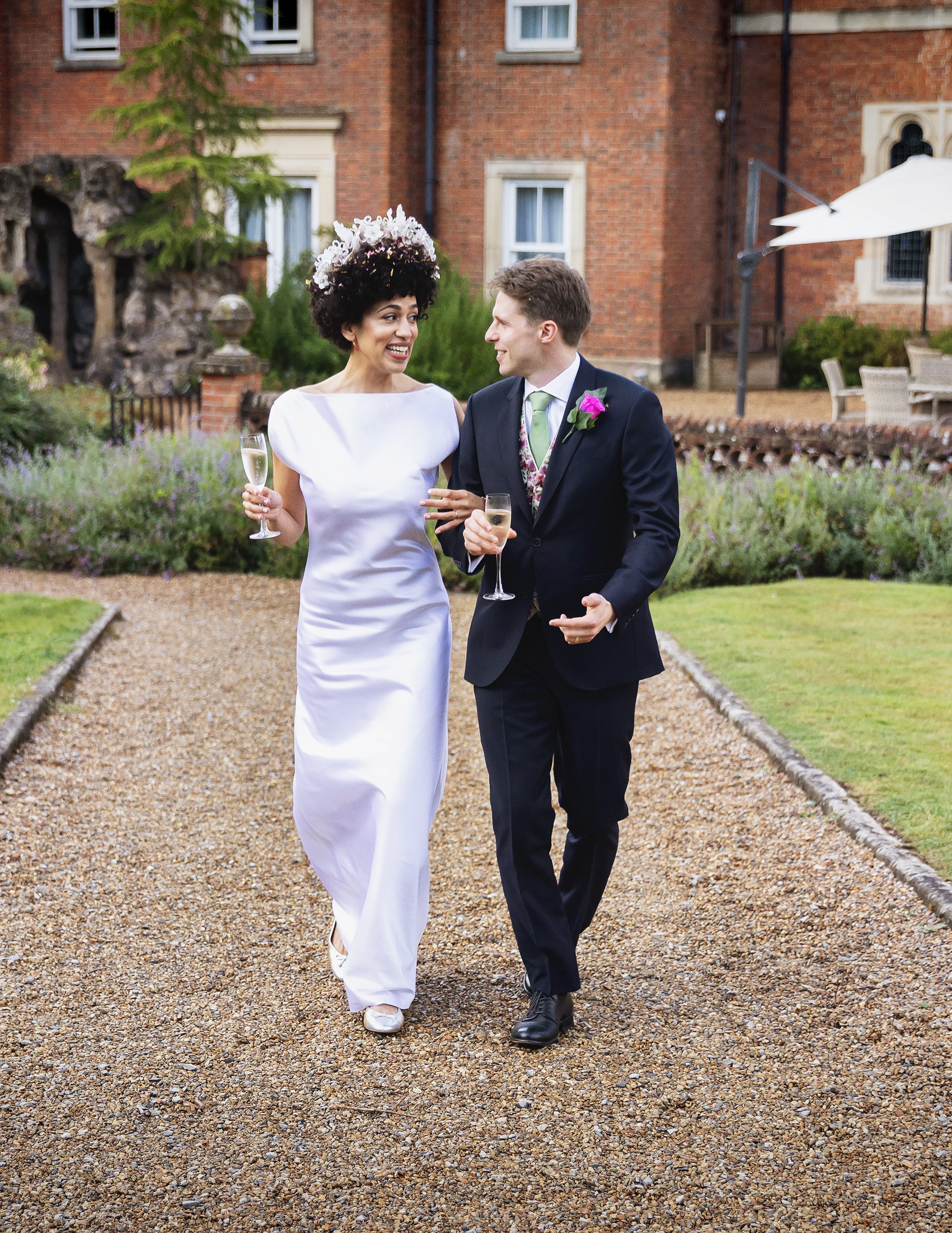 Wedding couple walk in grounds of Wotton House 2