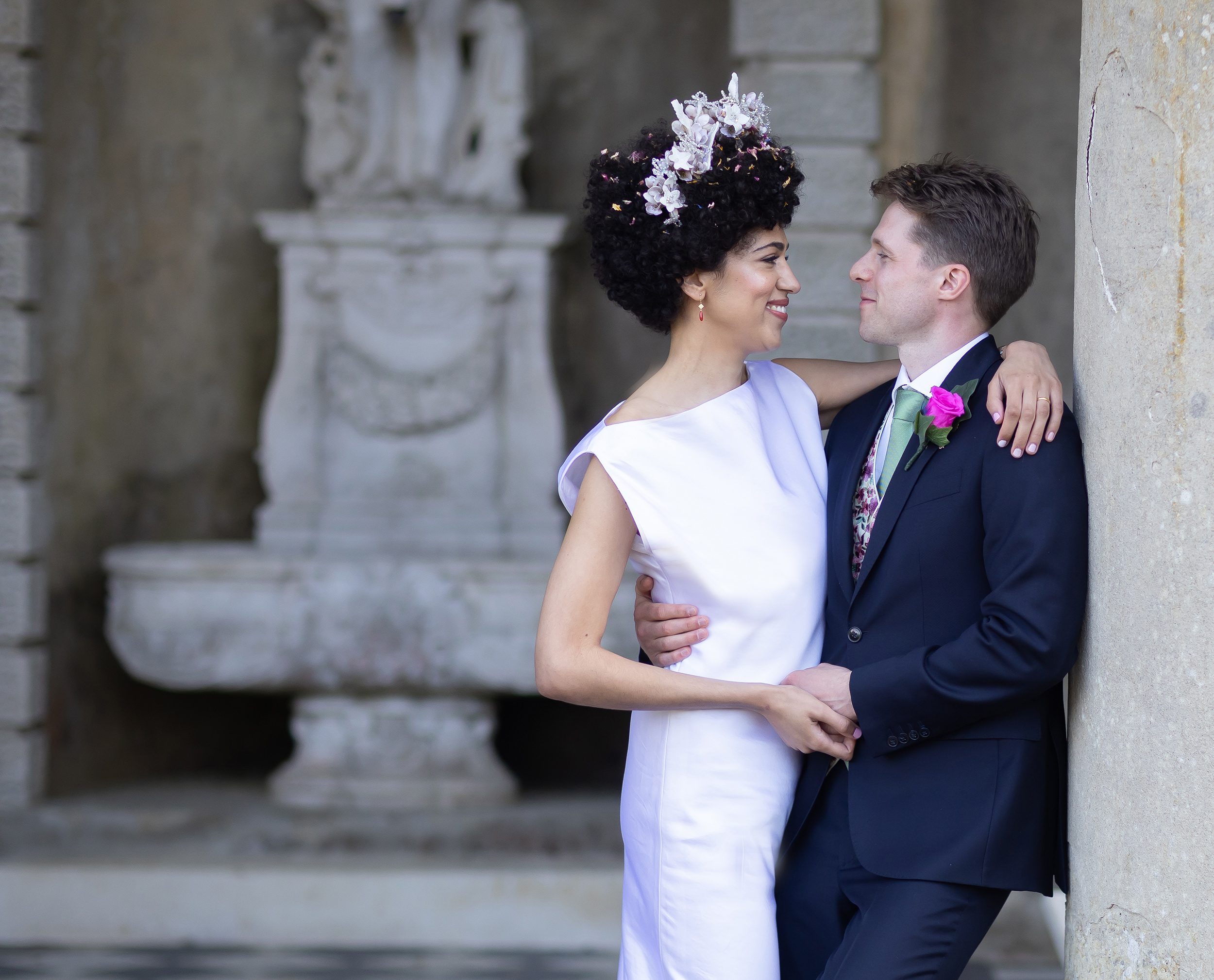 Wotton House bride and groom hug in grounds