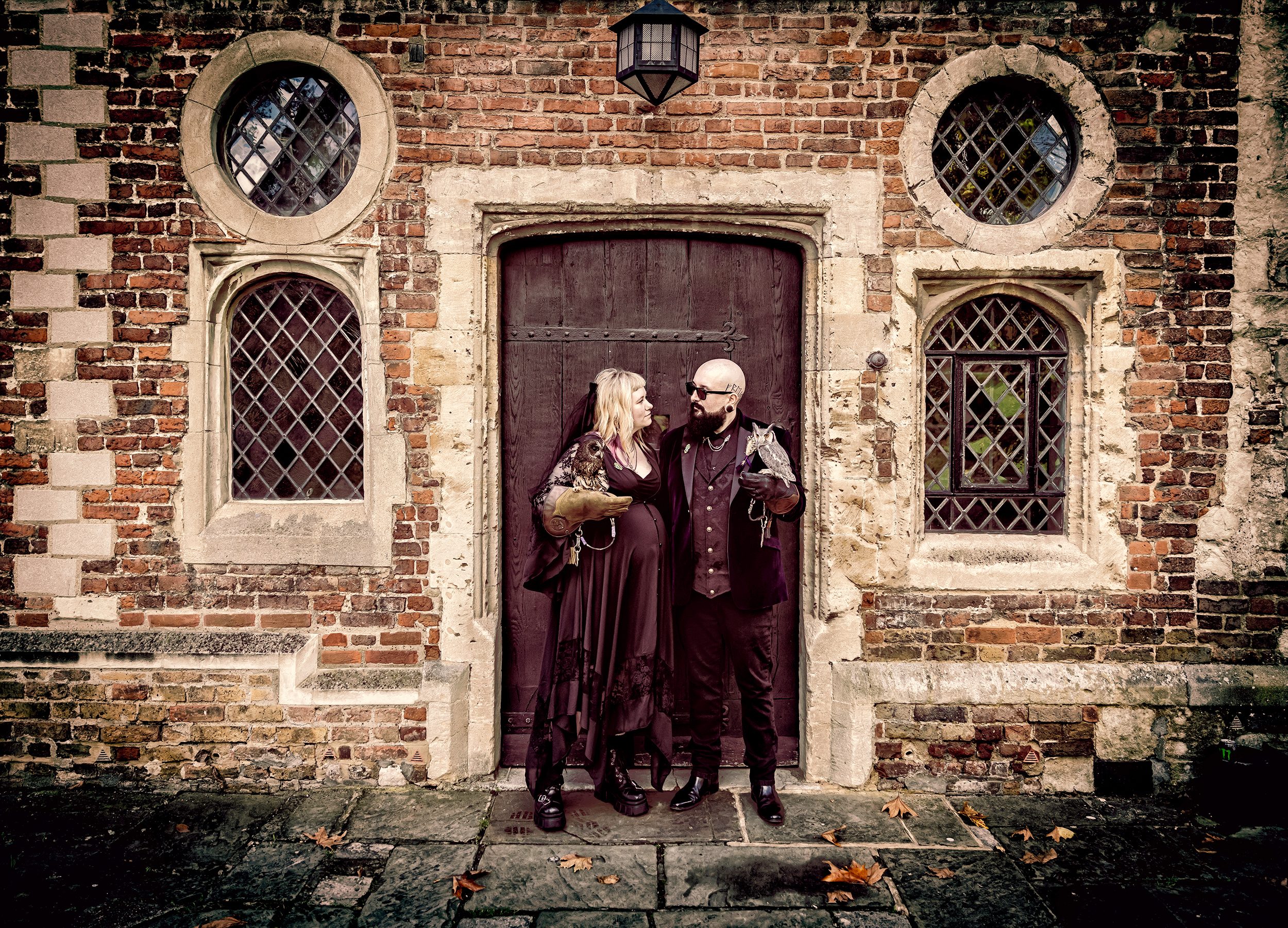 Alternative wedding couple with owls outside Hall Place Dartford