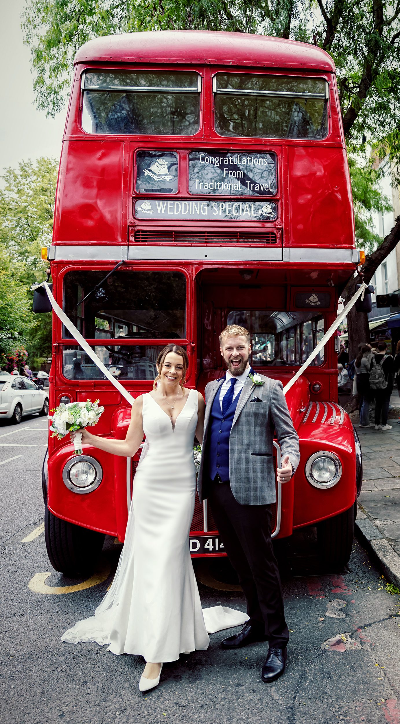 Couple and wedding bus outside Islington Town Hall