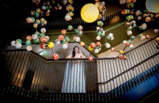 Bride by DNA sculpture Cambridge wedding