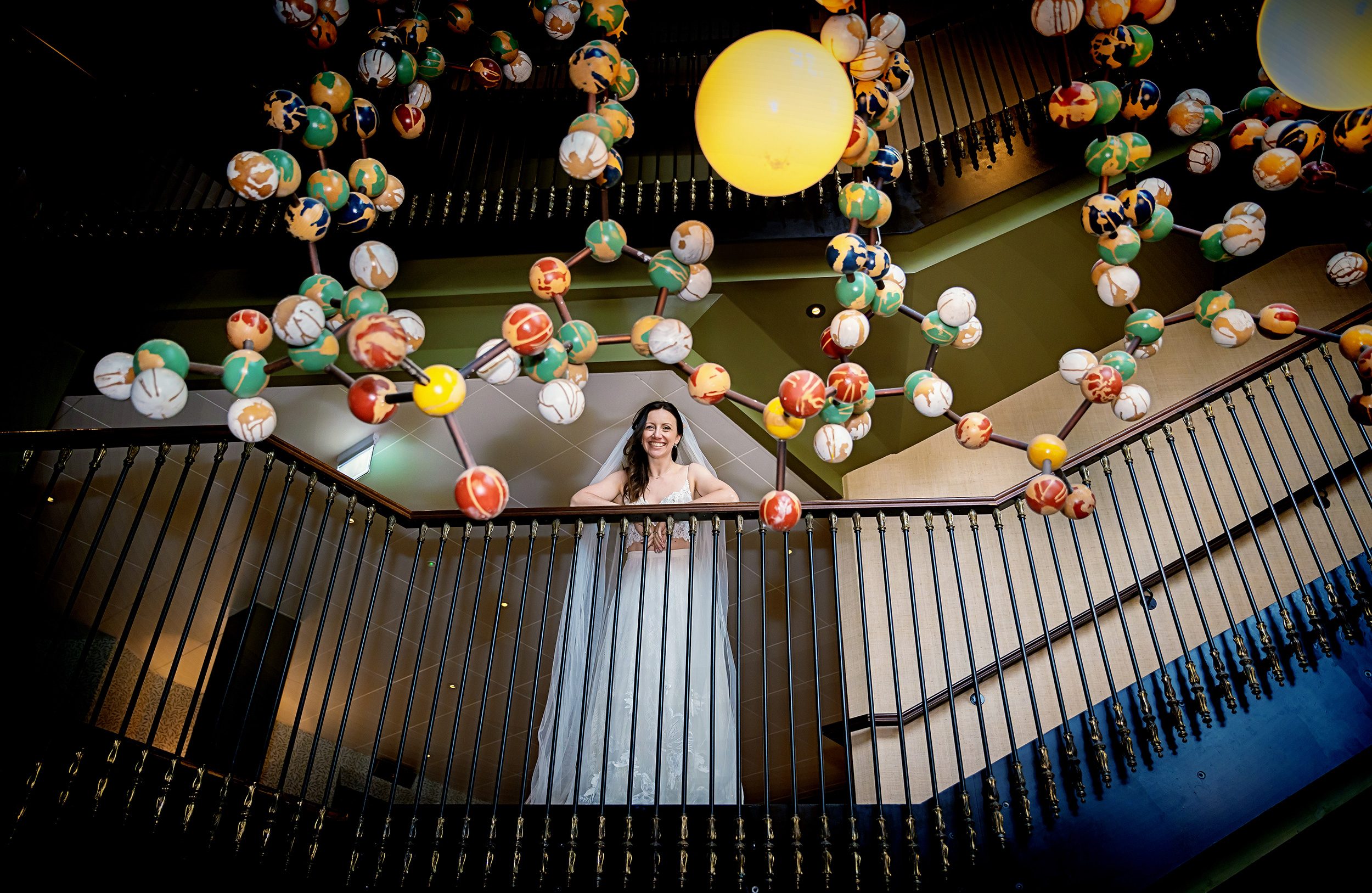 Bride by DNA sculpture Cambridge wedding