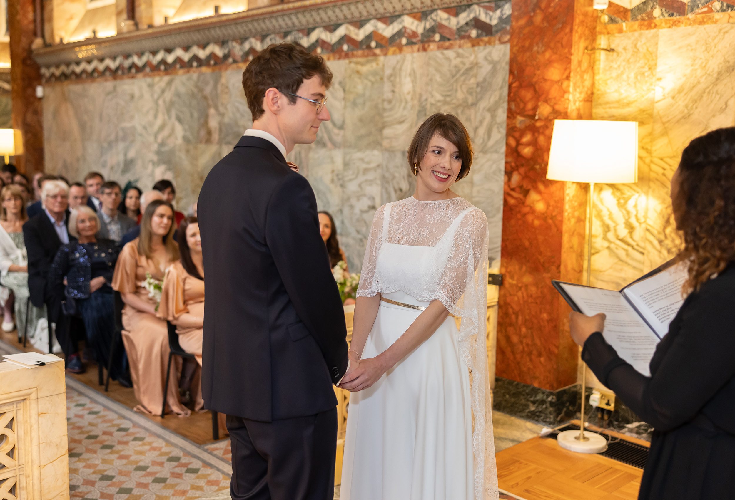 Exchange of vows Fitzrovia Chapel wedding ceremony