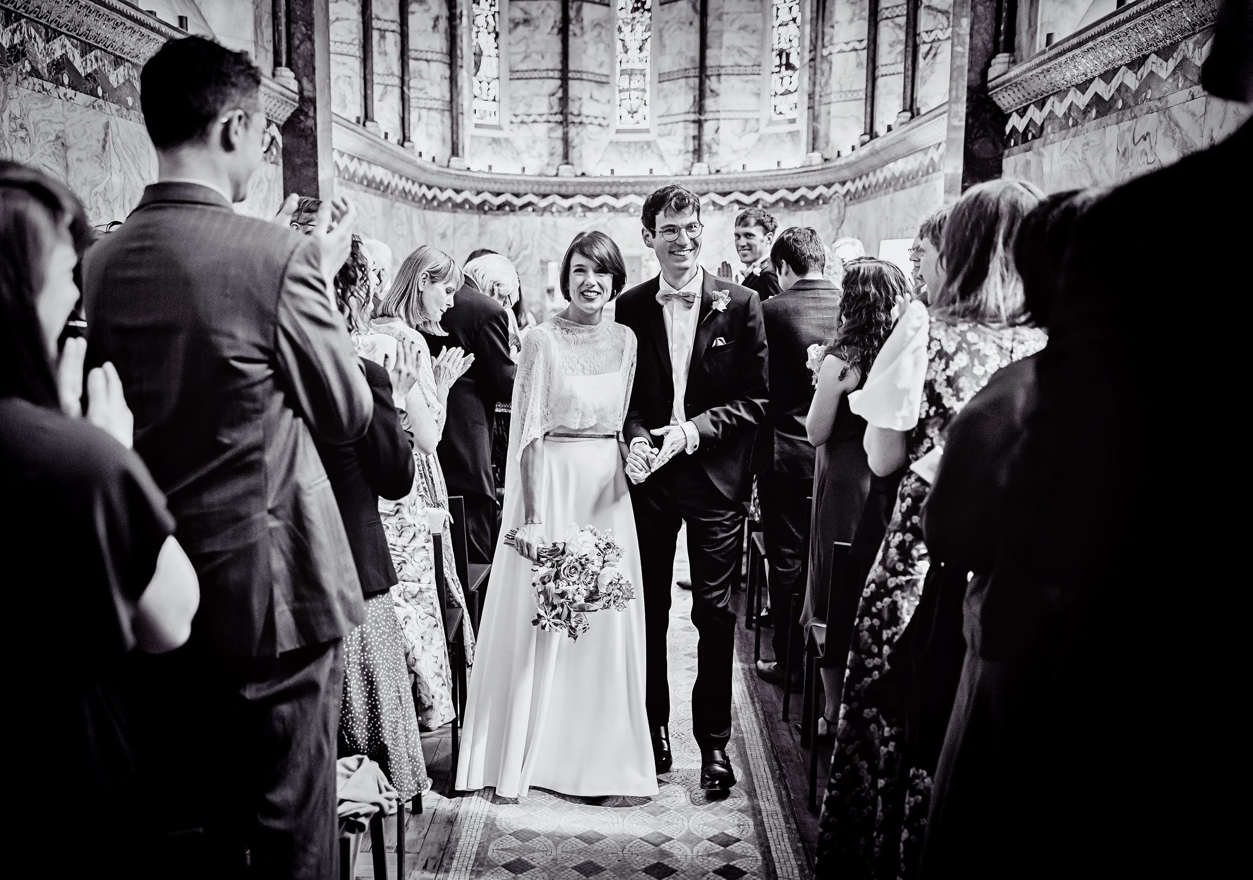 Fitzrovia Chapel Wedding ceremony recessional black and white