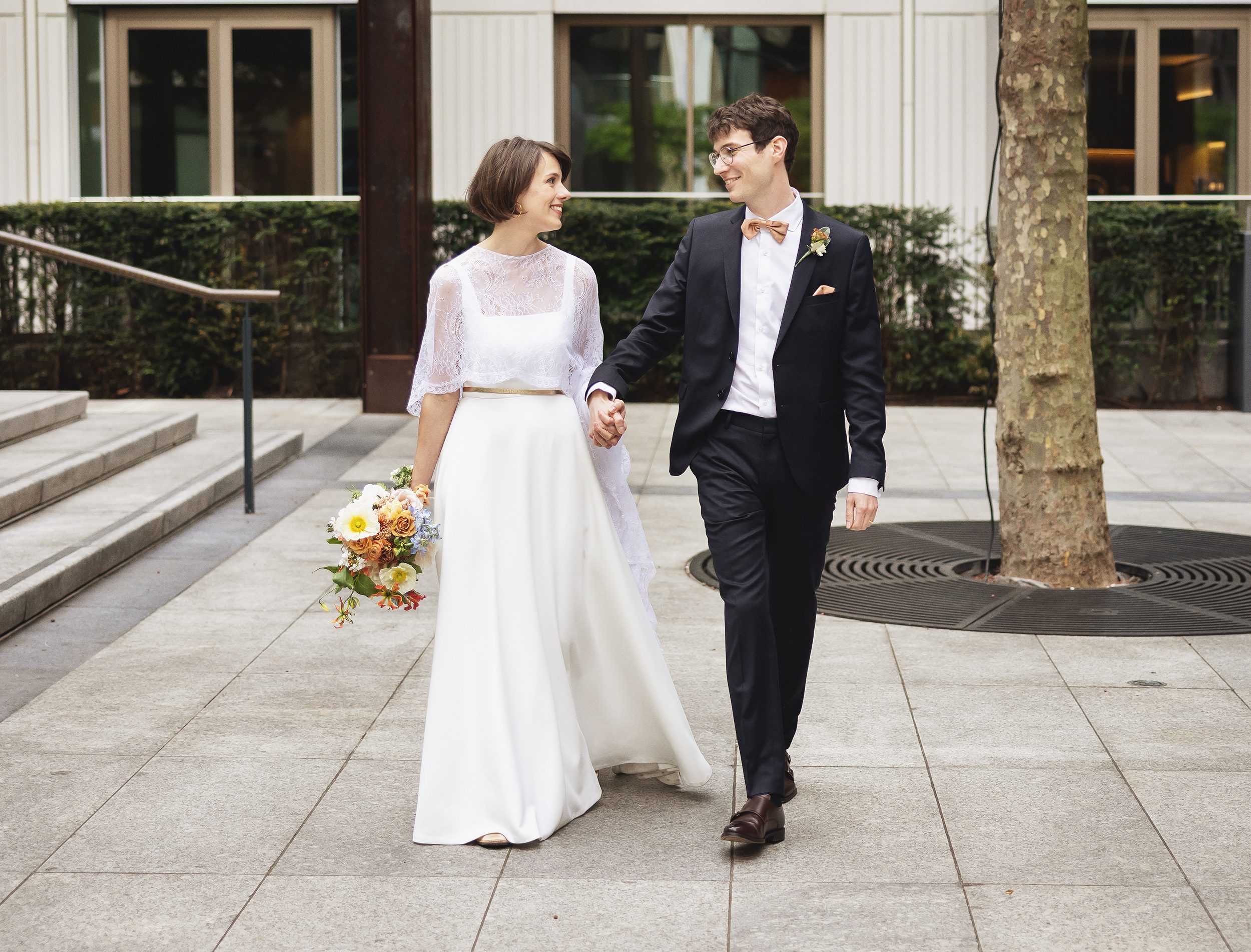 Wedding walking shot through Fitzrovia central London