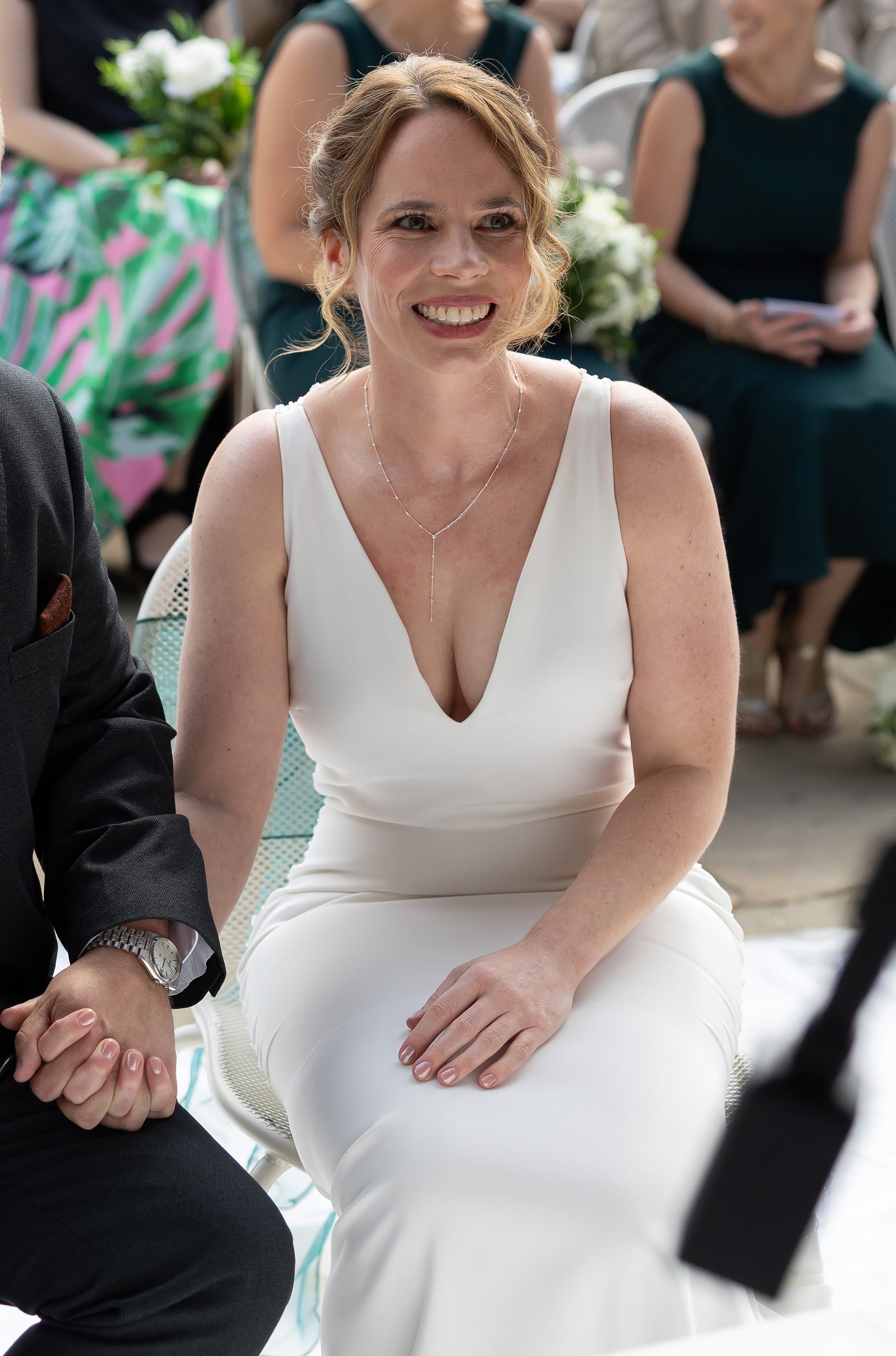 Bride smiling during Pembroke Lodge Wedding Ceremony outdoor