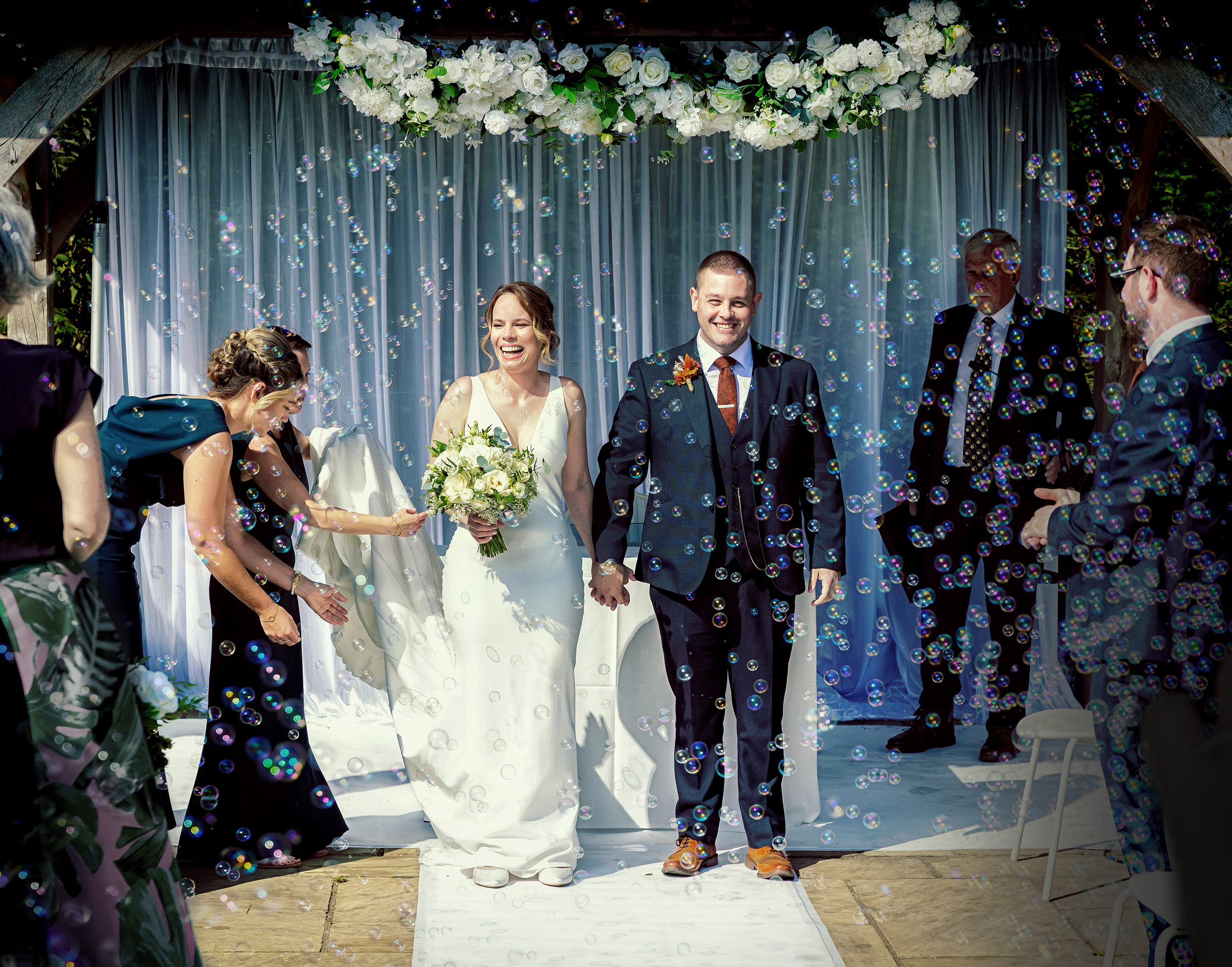 Pembroke Lodge Wedding bubble shower with bride and groom