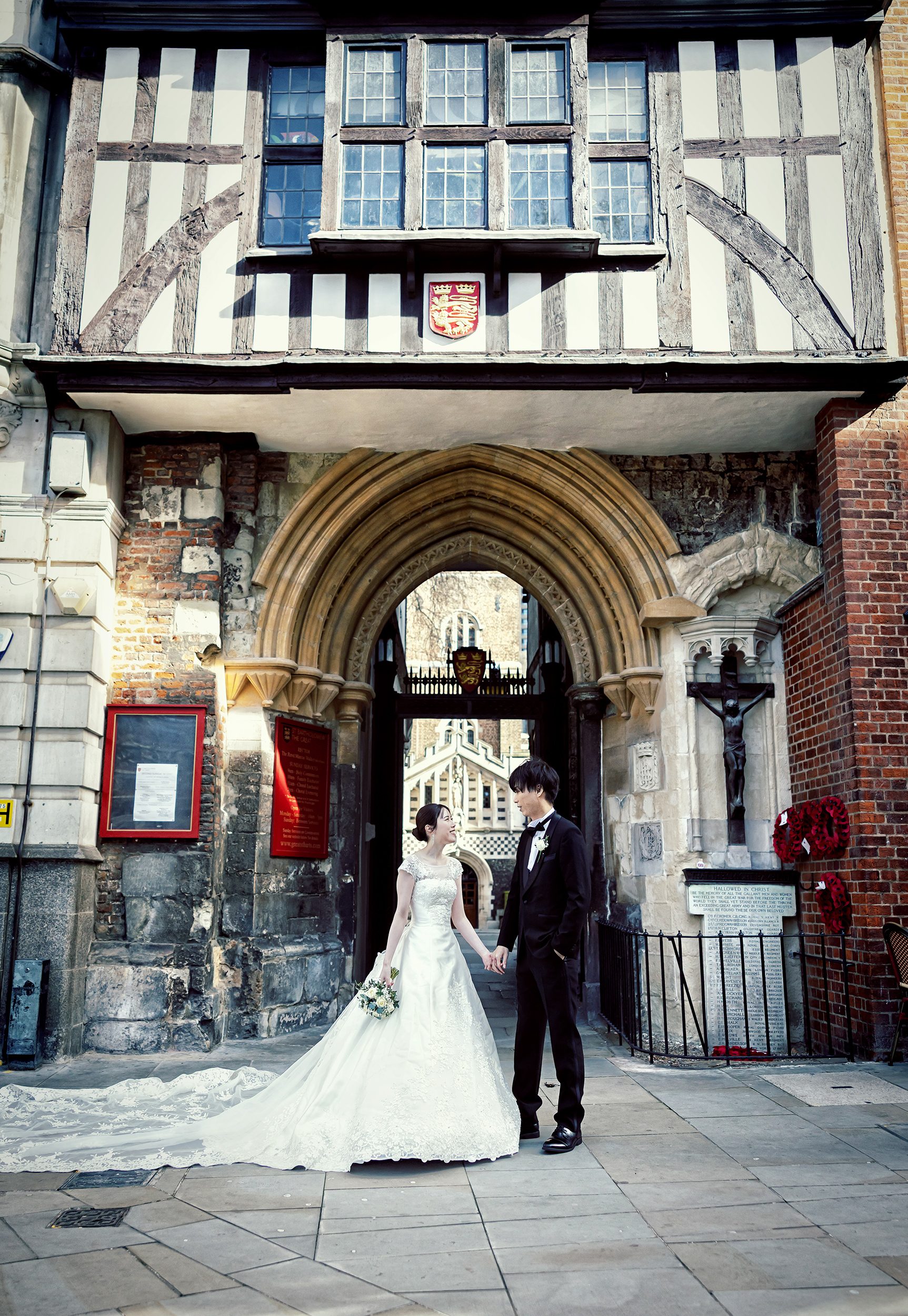 Bride and groom outside Great St Bartholomews London