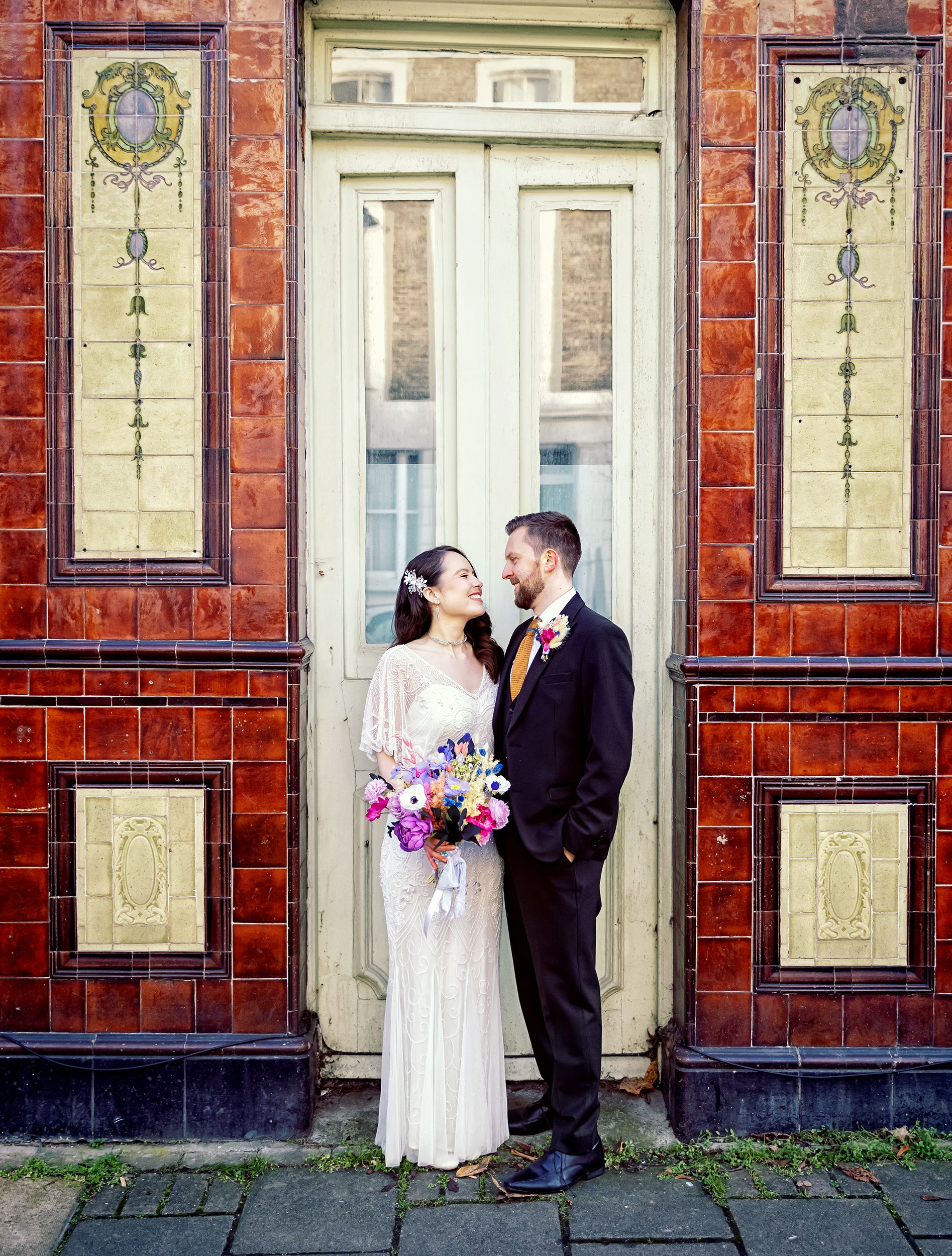 Bride and groom outside old Islington pub image