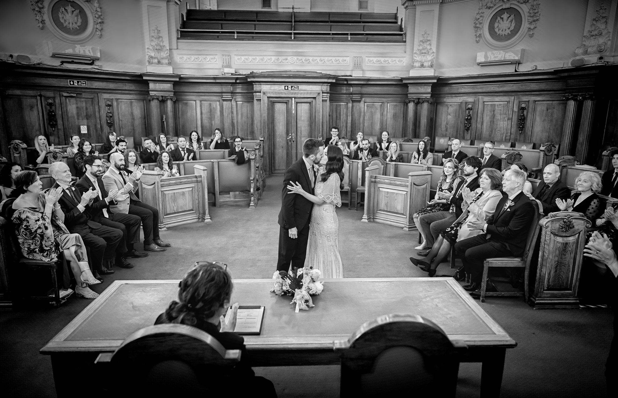 First kiss at Islington Town Hall wedding ceremony